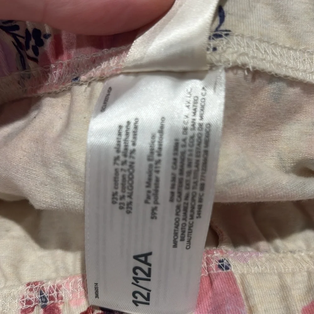 Oshkosh B’gosh - girls leggings. Size 12. Cream with Floral design. NWOT